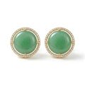 A pair of gold round stud earrings featuring smooth aqua blue cabochon gemstones surrounded by a halo of small clear stones, set against a plain white background.